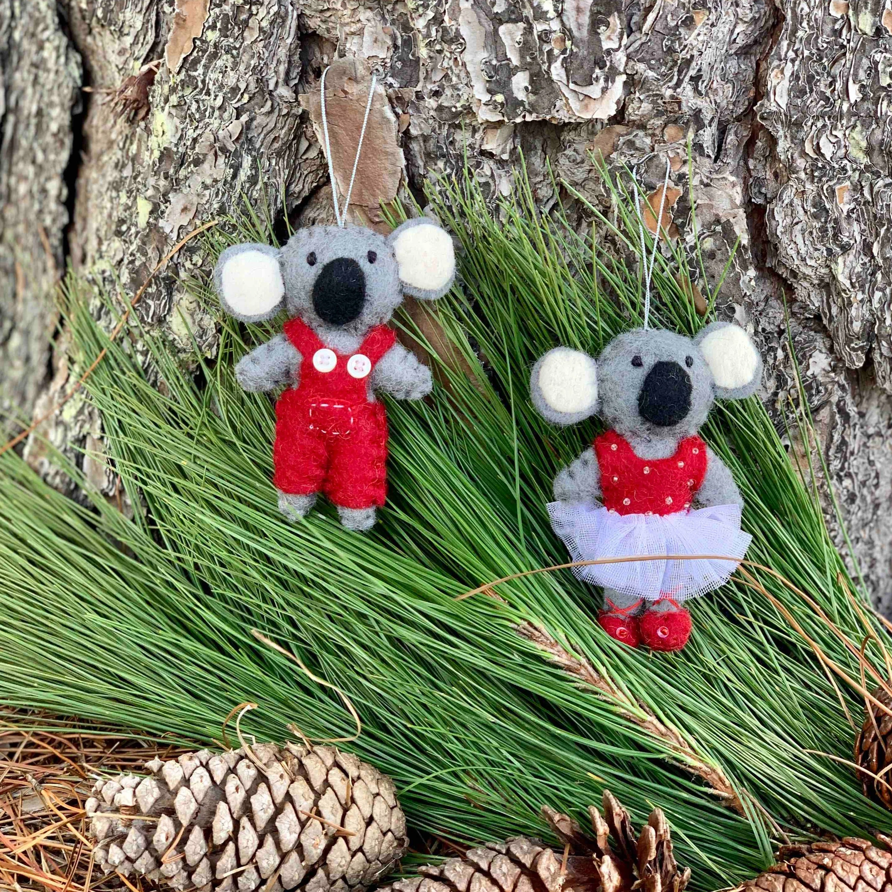 Christmas Koalas in festive outfits