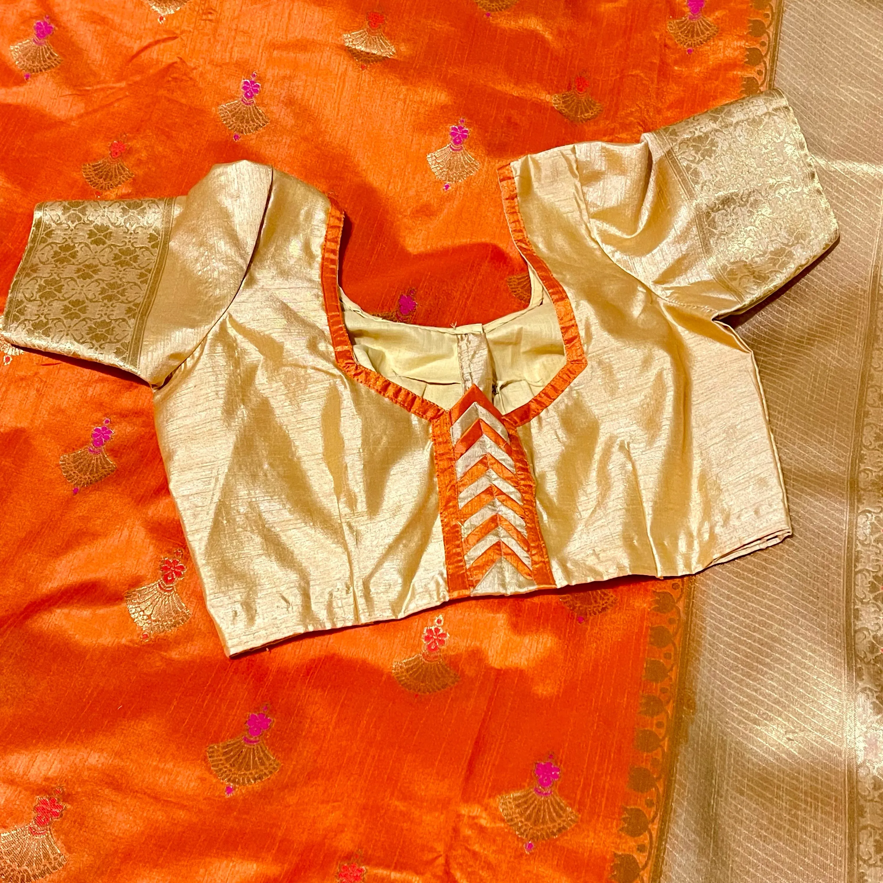 Orange and Gold Banarasi Jute silk saree with stitched Blouse